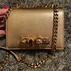Alexander McQueen gold cross body bag